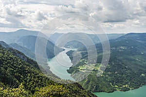 Landscape view from Banjska Stena on Drina river, mountains, dam and borde
