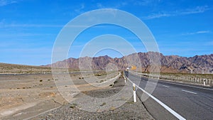 Landscape view of beautiful blue sky and high way road in Gansu Cina photo