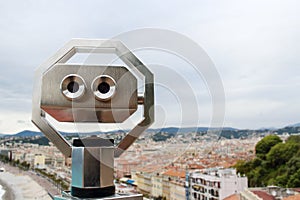 Landscape view binocular on nice city background