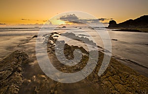 A landscape view of Broad Haven beach at dusk and sunset in Broad Haven, Pembrokeshire, Wales, UK. Taken in July 2014