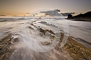 A landscape view of Broad Haven beach at dusk and sunset in Broad Haven, Pembrokeshire, Wales, UK. Taken in July 2014