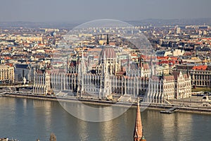 A landscape view of Budapest city in the evening, the Hungarian parliament building and otherr buildings along Danube