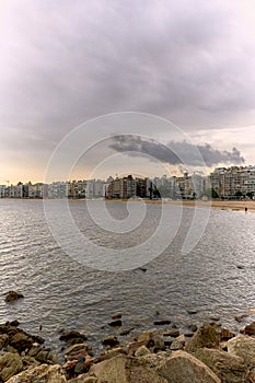 Landscape view of the city of Montevideo in the area of Pocitos. Tourist place in Uruguay, sunset on a cloudy day