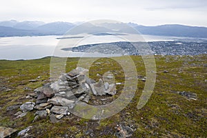 landscape view of the city of Tromso seen from Fjellheisen mountain (Norway) photo