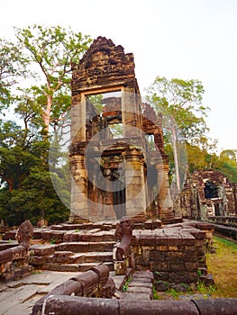 Landscape view of demolished stone architecture at Preah Khan temple Angkor Wat complex, Siem Reap Cambodia. A popular tourist