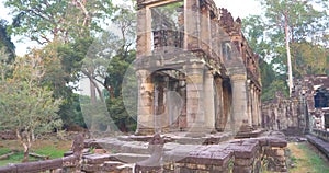 Landscape view of demolished stone architecture at Preah Khan temple Angkor Wat complex, Siem Reap Cambodia. A popular tourist