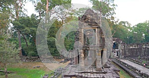 Landscape view of demolished stone architecture at Preah Khan temple Angkor Wat complex, Siem Reap Cambodia. A popular tourist