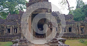 Landscape view of demolished stone architecture at Preah Khan temple Angkor Wat complex, Siem Reap Cambodia. A popular tourist