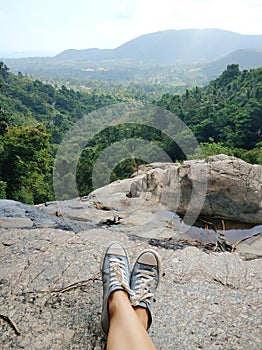 Landscape view from a high cliff to the jungle valley. Relax with incredible views after a long climb