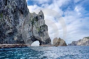 Landscape view with of a hole in the rock, Piercy Island, New Zealand
