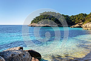 landscape view of the idyllic Cala Mitjana in southern Menorca