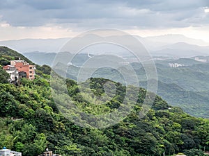 Lanscape view of Jiufen village, mountain and sea view. photo