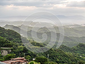 Lanscape view of Jiufen village, mountain and sea view. photo