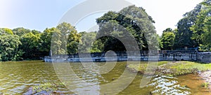 Landscape view of the lake in the Belgrad Forest, Istanbul with lush trees reflected on water