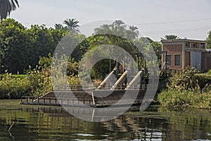 Landscape view of large pumping station on river nile in Egypt