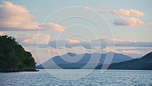 Landscape view of Loch Ness, Scotland, with mountains in the backgroun