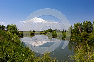 Landscape view of the Mount of Ararat reflected in the river of