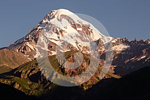 Landscape view of mountain Kazbeg on sunrise, Caucasus mountains, Country of Georgia