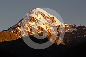 Landscape view of mountain Kazbeg on sunrise, Caucasus mountains, Country of Georgia