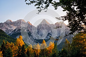 Landscape view of mountain peaks and colorful autumn foliage, Triglav, Slovenia photo