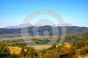 Landscape view of mountain range and autumn colorful hills, Slov