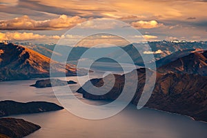 Landscape view of mountain range and lake at sunrise, Wanaka Lake, NZ