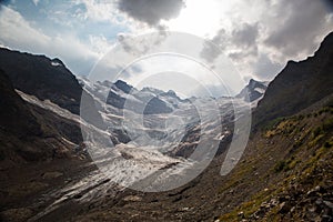 Landscape with a view of the mountains and a melting glacier