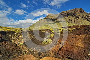 Landscape with view on mountains near Punto Teno Lighthouse