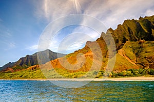 Landscape view of Na Pali coastline cliffs and beach, Kauai, Hawaii