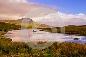 Landscape view of Old Man of Storr rock formation and lake, Scotland