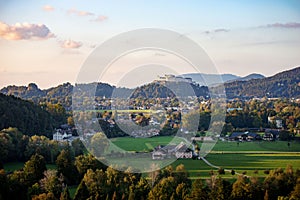 Landscape view of the Old town of Salzburg with Fortress Hohensalzburg at sunset