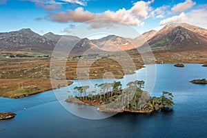 Landscape view At Pines Island and Twelve Bens, Derryclare Lough in County Galway Ireland seen from above