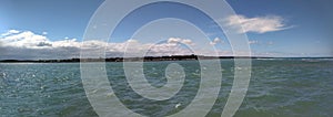 Landscape View of Porto Seguro, Brazil across a River with Blue Sky