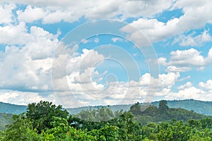 Landscape view of raining at forest and blue sky and cloud with