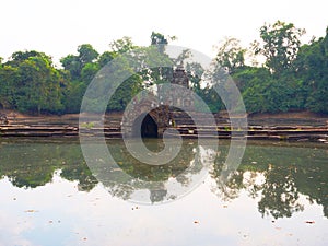 Landscape view with reflection of Neak Pean or Neak Poan in Angkor Wat complex, Siem Reap Cambodia