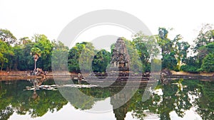 Landscape view with reflection of Neak Pean or Neak Poan in Angkor Wat complex, Siem Reap Cambodia