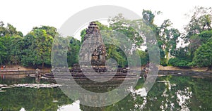 Landscape view with reflection of Neak Pean or Neak Poan in Angkor Wat complex, Siem Reap Cambodia