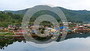 Landscape view with reflexion in the lake at Ban Rak thai village in Mae Hong Son Thailand