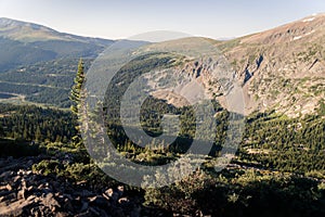 Landscape view of a roade winding through mountains in the morning near Quandary Peak.