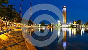 Landscape view of Roi-et Tower Famous landmark at Phlan Chai Swamp Lake Roiet Thailand