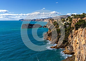 landscape view of the rugged cliffs and shoreline at Cabo de la Nao in Javea Bay