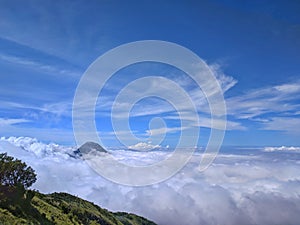 Landscape view of savanna in Mount Merbabu, Indonesia with blue sky background