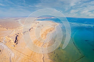 Landscape view of Sealine Sand dunes and lake in Doha Qatar