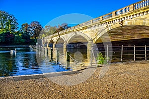 Landscape view of Serpentine Lake and Serpentine Bridge in Hyde Park, London, UK