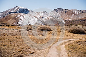 Landscape view of snow capped mountains at Independence Pass near Aspen, Colorado.