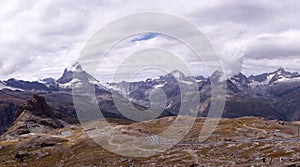 Landscape view of Swiss Alps with Matterhorn and Riffelsee Lake on the left