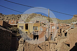 Landscape view traditional red clay houses at desert mountain village of Abyaneh county of Natanz Isfahan in Iran