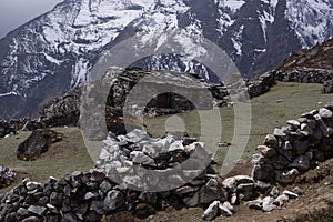 Landscape view of traditional rural stone house in Nepal.