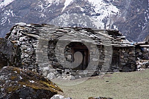 Landscape view of traditional rural stone house in Nepal