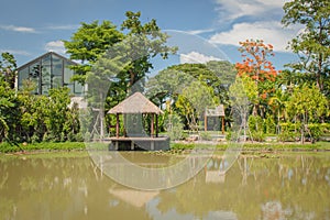 Landscape view of Traditional waterfront wooden pavilion locate nearly lake.